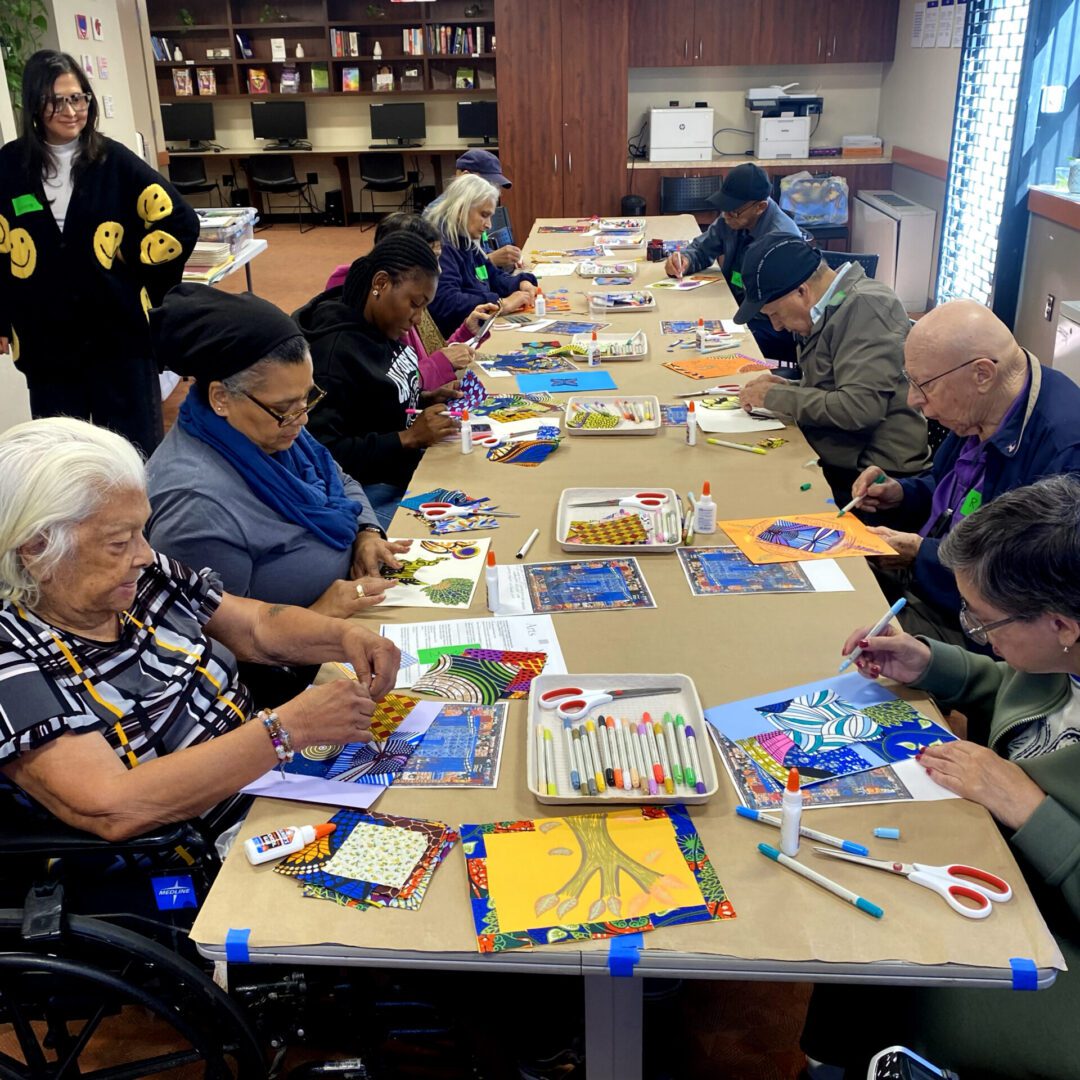 Seniors engaged in a group craft activity at a community center.